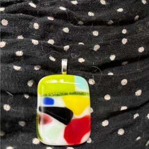 Dichroic glass pendant, one of a kind.  photo doesn’t do justice